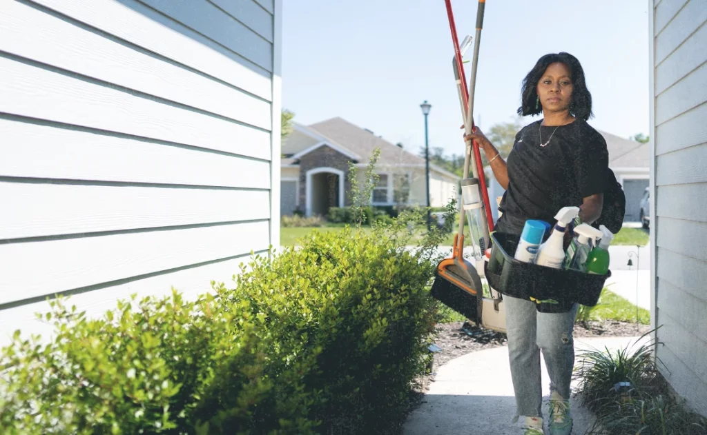 image of cleaner arriving at a customer's property after using Jobber's cleaning software