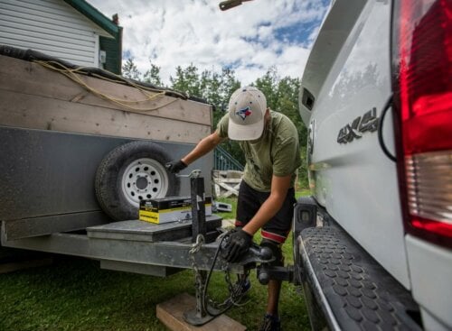 Contractor Truck with Trailer Hitch: Junk Removal, Roofing Contractor