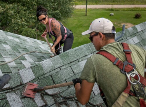 Professional roofers at work