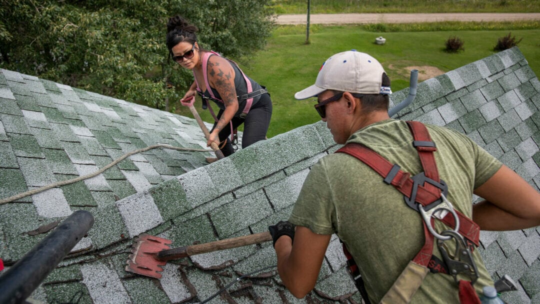 Professional roofers at work