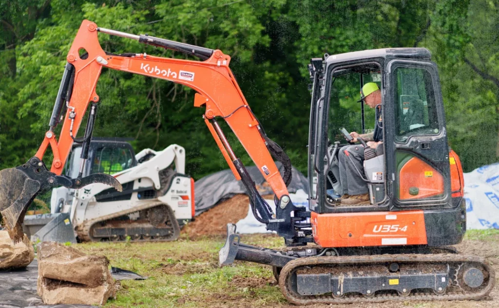 image of service provider in an excavator after using Jobber's excavation software