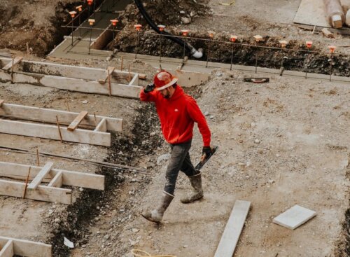 Concrete worker who uses Jobber's concrete contractor software