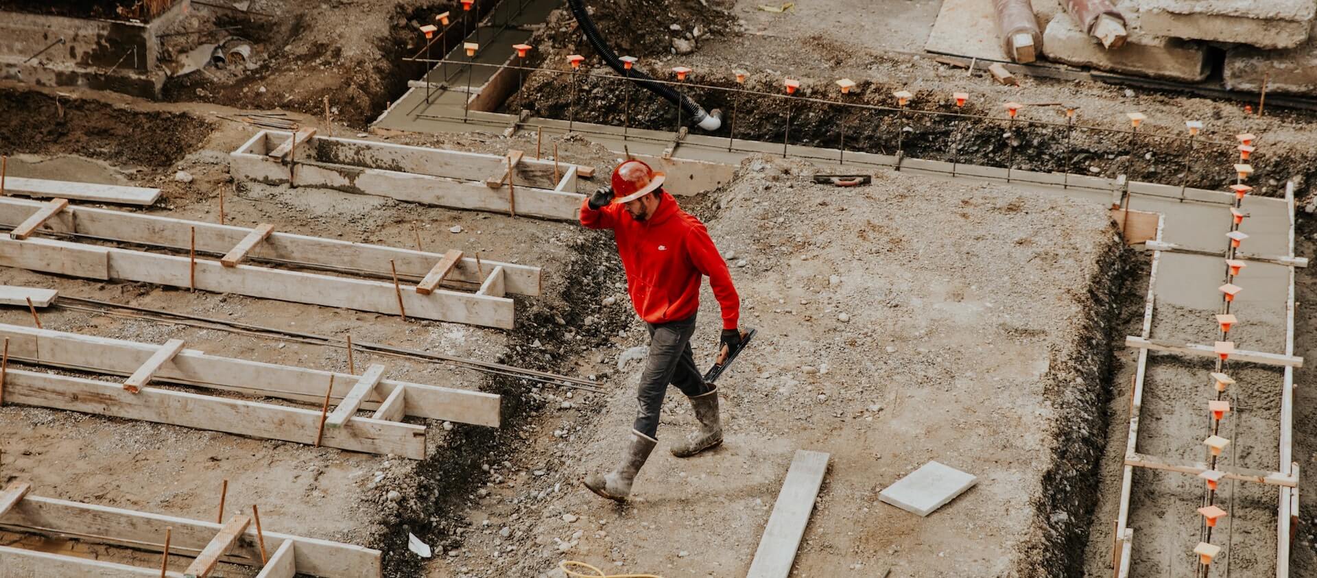 Concrete worker who uses Jobber's concrete contractor software