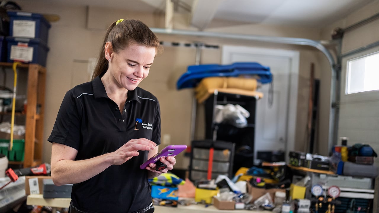 Photo of an HVAC business owner learning how to get HVAC leads online
