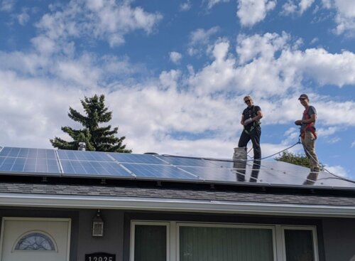 image of Kite Electric team installing solar panels
