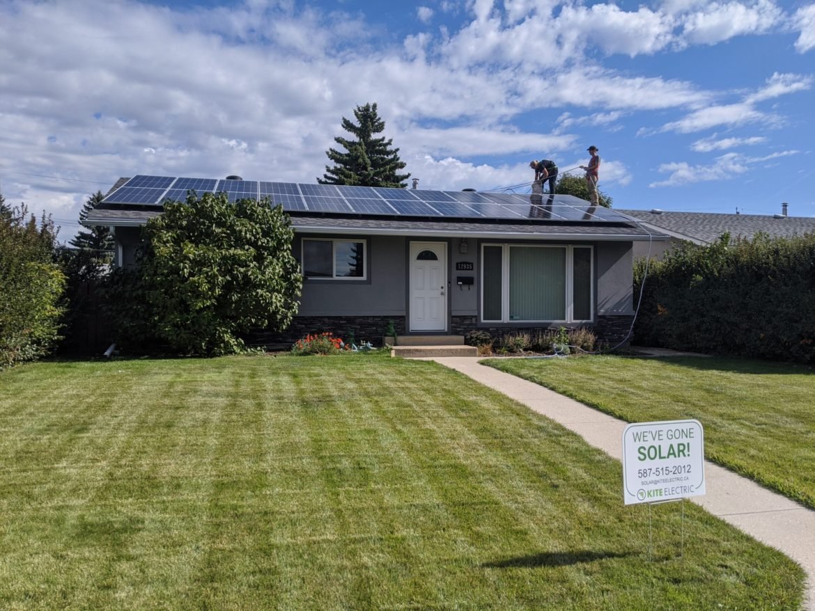 image of house with solar panel installation