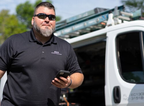 image of electrician walking to job site