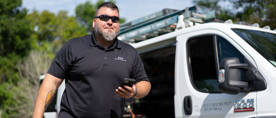 image of electrician walking to job site