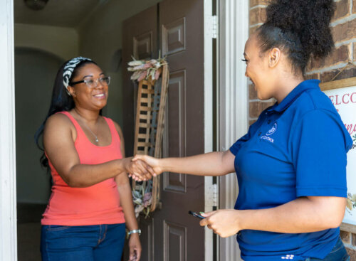 image of service provider shaking customers hand