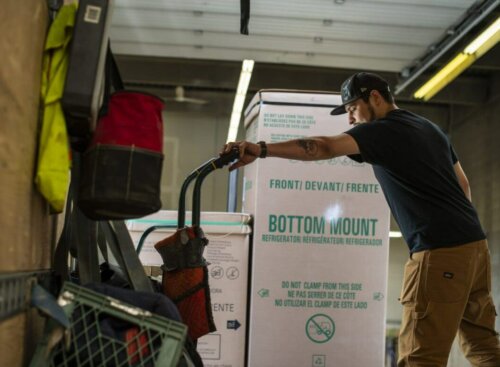 image of service provider moving appliances