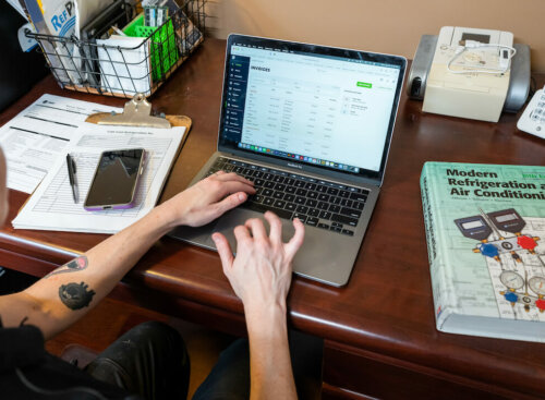 woman working on laptop at desk