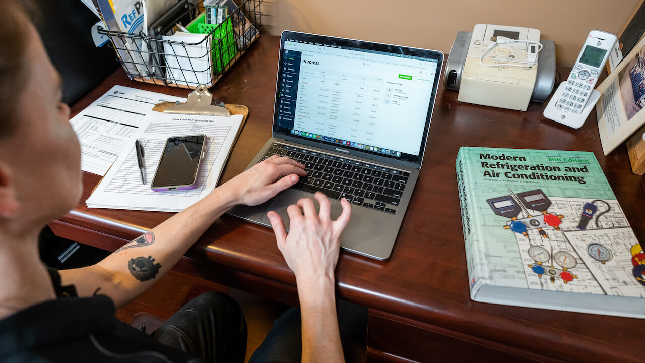 woman working on laptop at desk