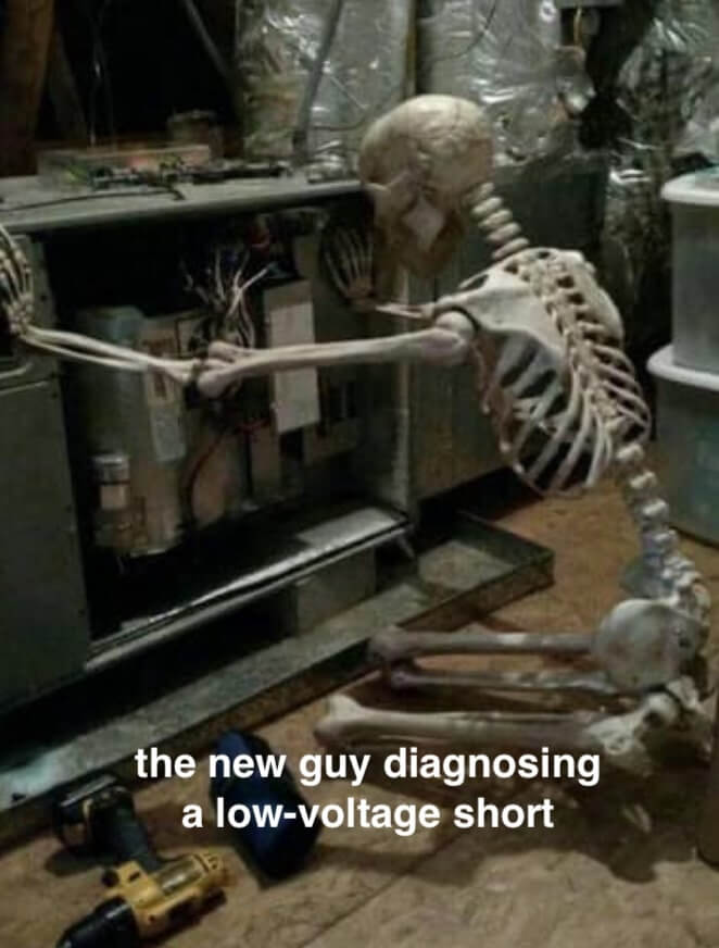 A skeleton inspecting a furnace. The caption says “the new guy diagnosing a low-voltage short”