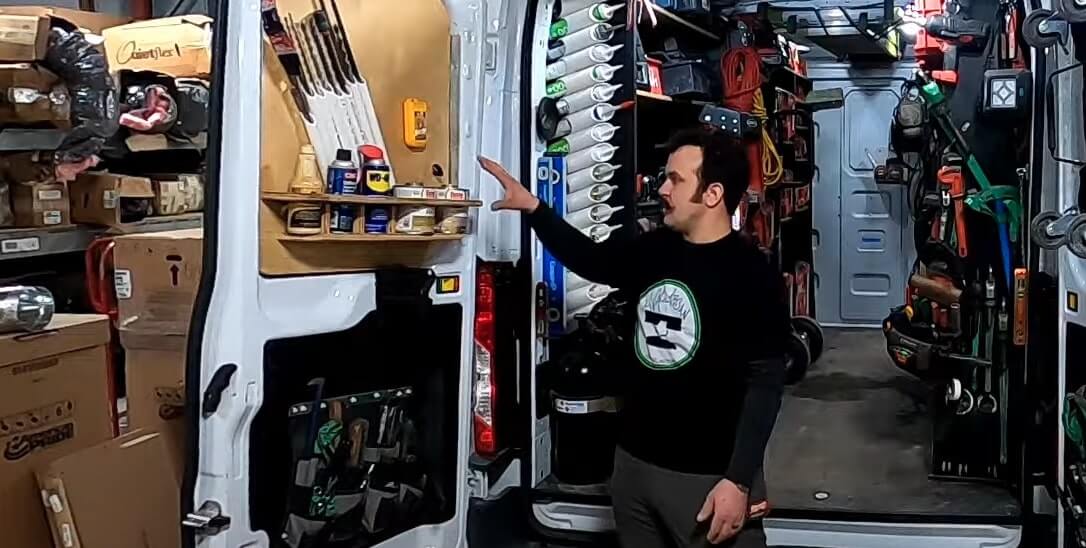 Noah from HVAC Artisan showing his HVAC van tool slots