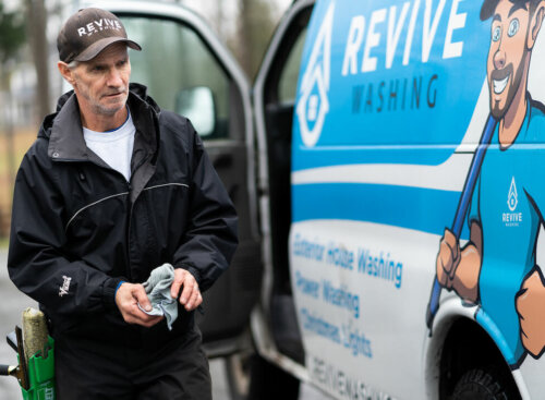 image of window washer from Revive Services