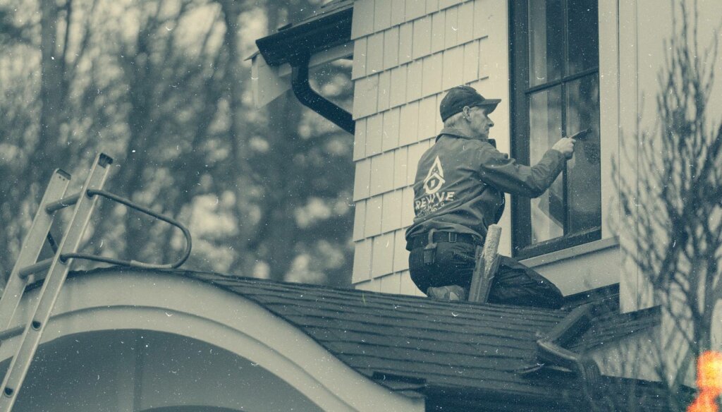 comparison page hero image of window washer at work