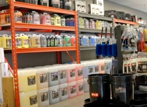 Shop with car detailing cleaning equipment and supplies