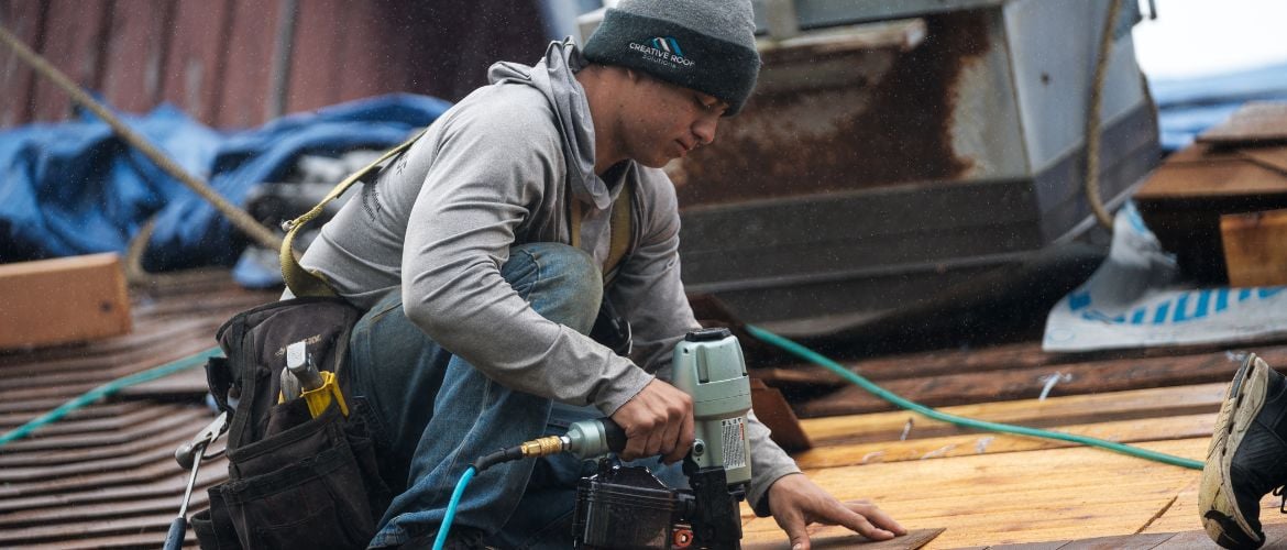 Roofer working on a roof replacement