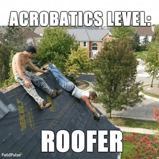 One roofer sitting on the ridge of a roof while one is belly down lying diagonally doing the job with roofing meme caption