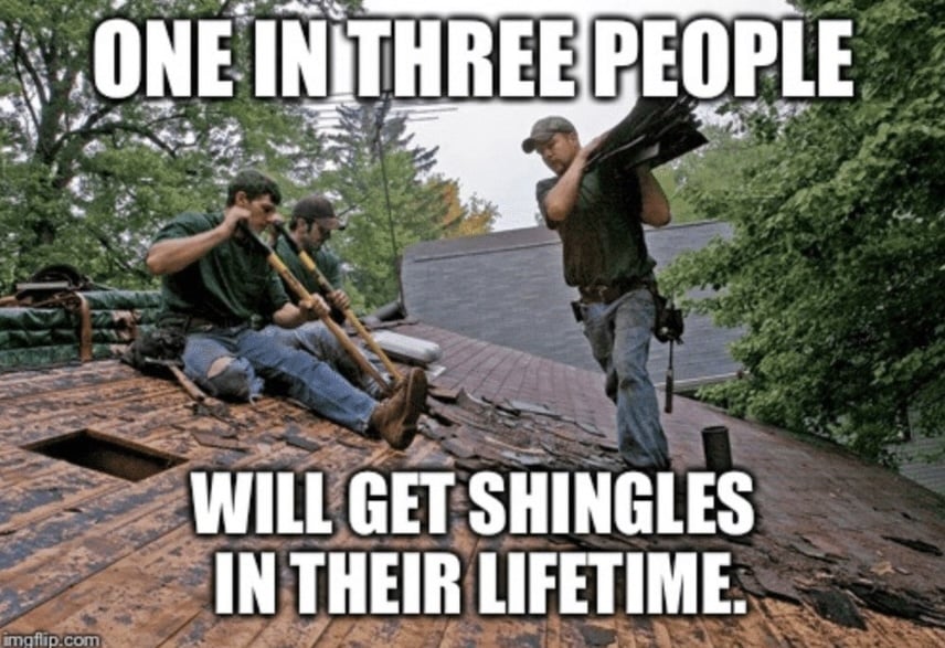 Three roofers working—two sitting with tools, one carrying bundles of shingles with roofing meme caption