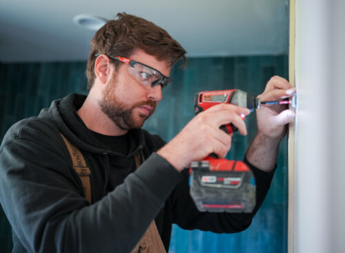 image of contractor completing tasks off of a punch list