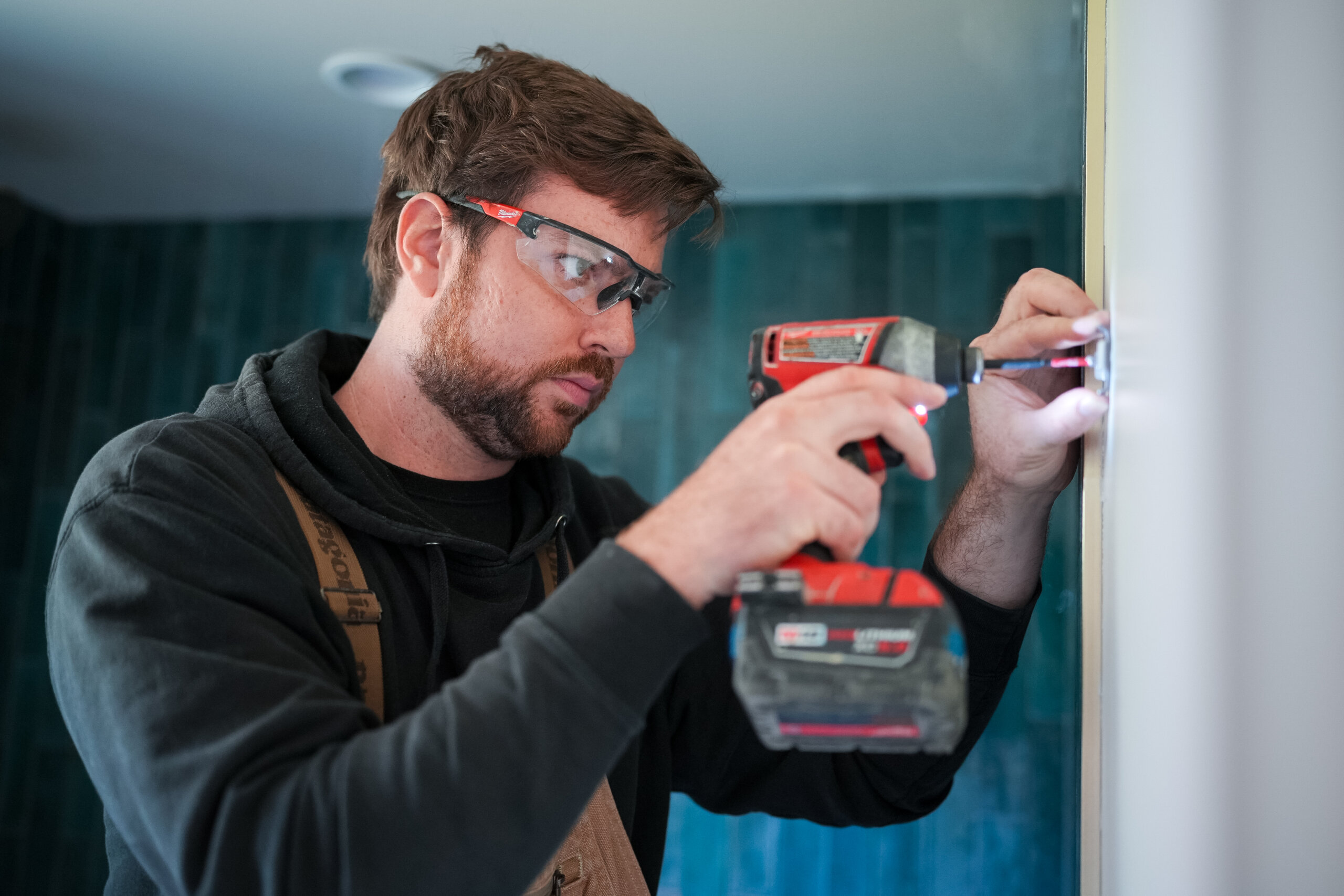 image of contractor completing tasks off of a punch list