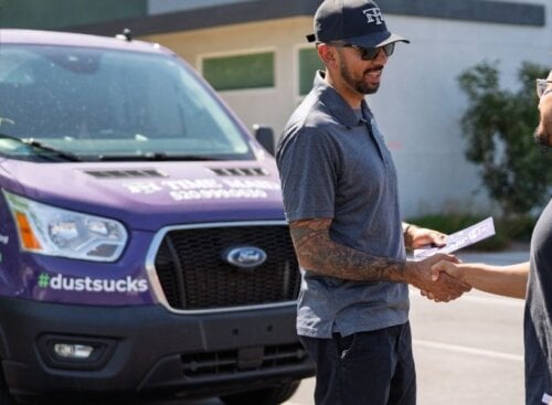 Service provider shaking hands with a customer
