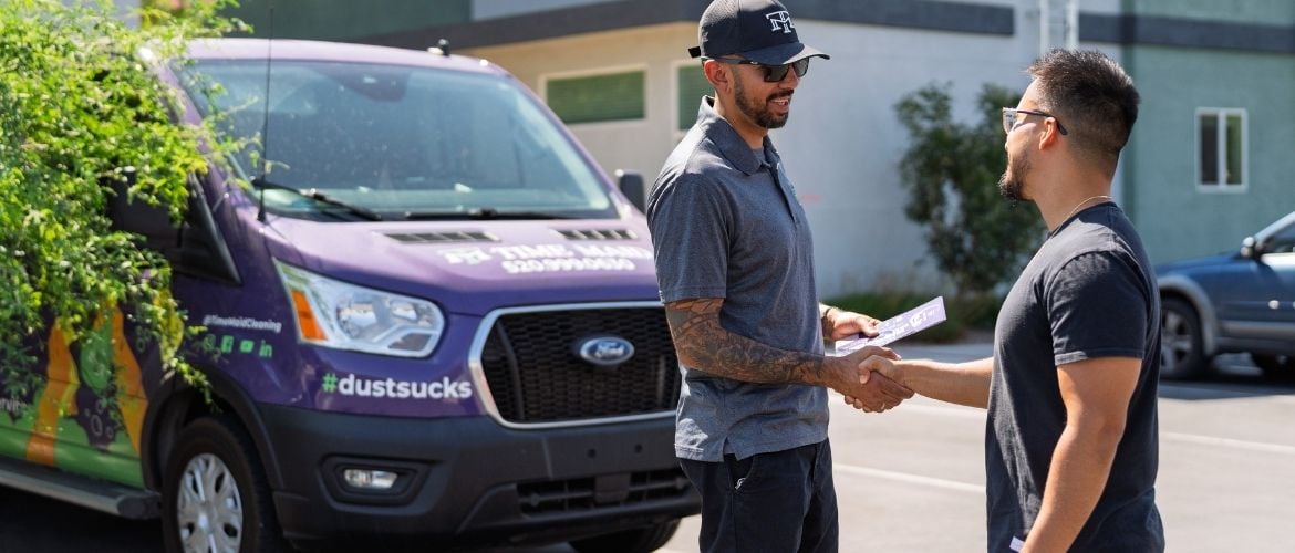 Service provider shaking hands with a customer