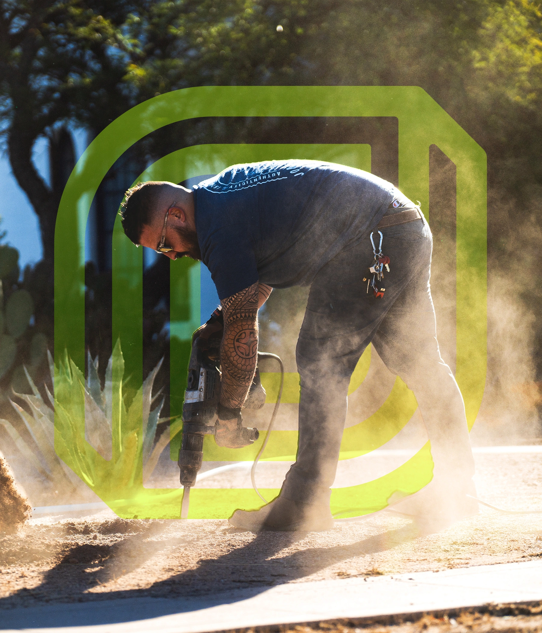 A man drilling the ground.