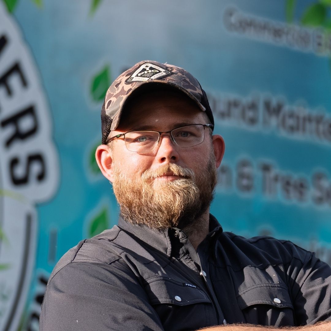 Headshot of Chris Chase, owner of Grass Groomers.