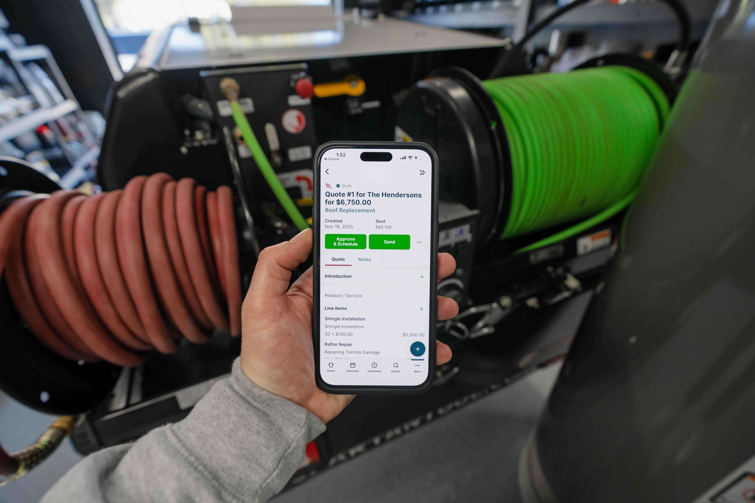 A smartphone screen displaying a professional plumbing quote with line items and customer notes.