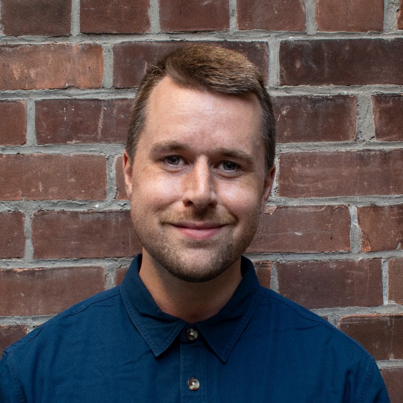 headshot of alex cleary